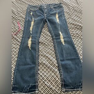 Distressed vintage jeans from early 2000s made by L.A. idol